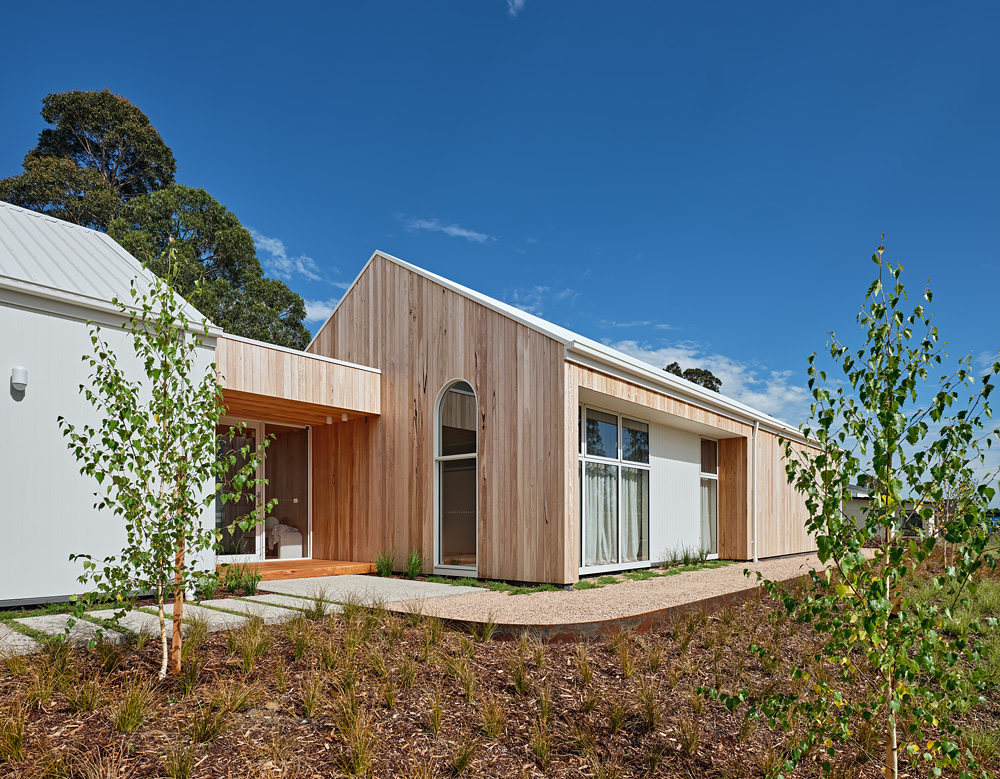 Contemporary residential property featuring sustainable design, natural materials, and spacious living areas, ideal for those seeking land for sale in Gippsland.